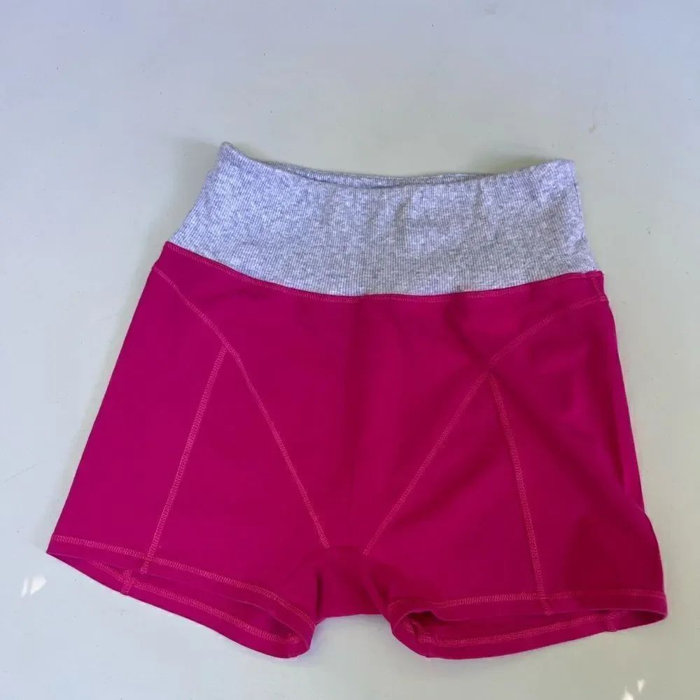 Urban Outfitters out from under pink mini bike shorts Small